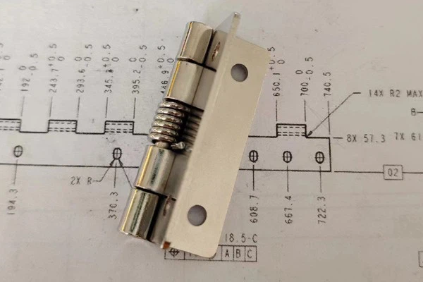 Metal Spring Hinges Are Made Of Pure Iron And Are Specially Treated To Be Strong And Durable. They Are Commonly Found On Factory Warehouse Doors.